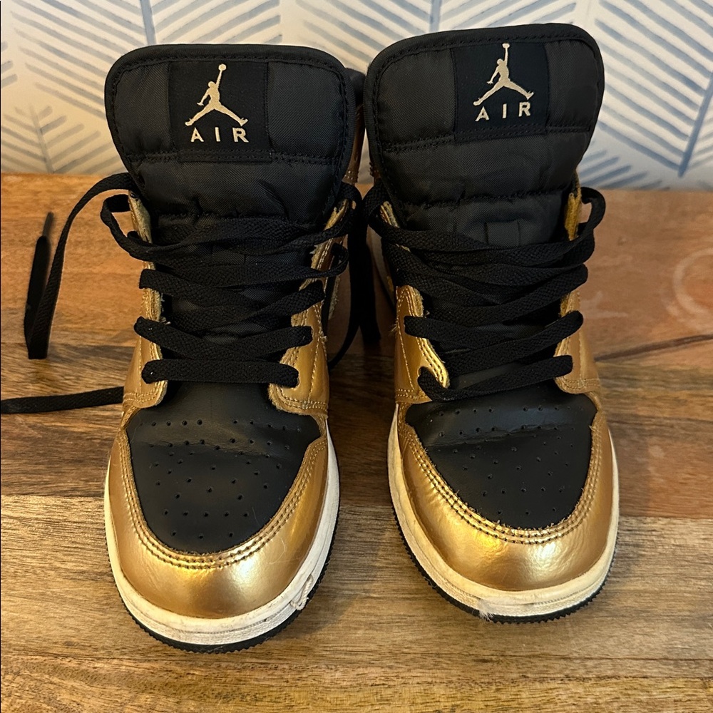 Air Black and Gold Sneakers. Nike